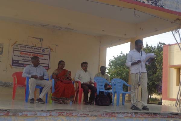 A NABARD village-level awareness programme, addressing self-help groups.