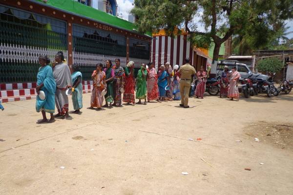Community members arriving for an outreach camp.