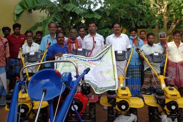 Power weeders handed over to a farmer group under a community support programme.