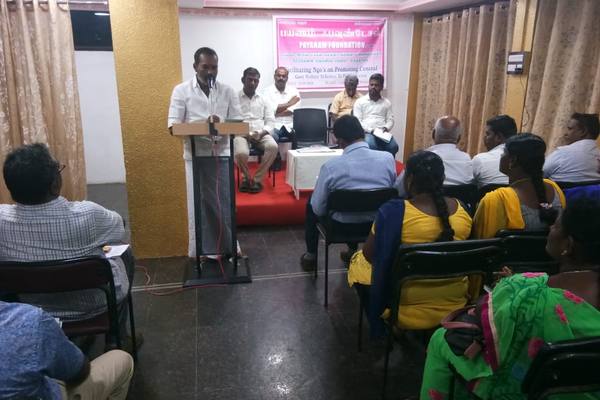 A facilitation session on government welfare schemes for local NGOs.
