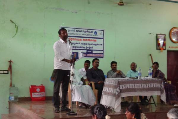 Villagers gather for an awareness session on self-help groups and livelihoods.