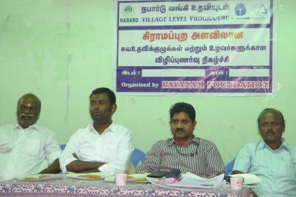 A village-level awareness programme run with NABARD.